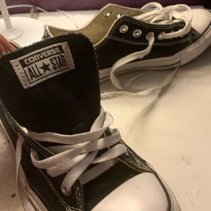 Low top All Star Converse.